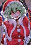  1girl alternate_costume bangs blush bobblehat breasts cleavage eyebrows_visible_through_hair fur-trimmed_capelet fur-trimmed_hat gloves glowing glowing_eyes green_hair hair_between_eyes hat hole_in_wall kazami_yuuka large_breasts leaning_forward looking_at_viewer narrowed_eyes naui_kudan open_mouth pom_pom_(clothes) red_eyes red_gloves red_hat santa_costume santa_hat short_hair solo teeth touhou tsurime upper_body upper_teeth wall 