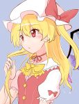  1girl bangs blonde_hair blue_background bow bowtie buttons commentary_request eyebrows_visible_through_hair flandre_scarlet hair_between_eyes hair_twirling hat hat_bow highres long_hair mob_cap neck_ribbon one_side_up oshiaki parted_lips puffy_short_sleeves puffy_sleeves red_bow red_eyes red_ribbon ribbon short_sleeves simple_background solo touhou upper_body white_hat yellow_neckwear 