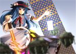  1girl apron blue_hair clere grin hat hinanawi_tenshi keystone long_hair looking_at_viewer neck_ribbon red_eyes ribbon skirt smile solo spell_card sword sword_of_hisou touhou weapon 