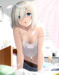  1girl :o absurdres bare_arms bare_shoulders black_legwear blue_eyes breasts calendar_(object) camisole chair cleavage clock curtains desk_lamp flower glass hair_ornament hair_over_one_eye hairclip hamakaze_(kantai_collection) highres indoors kantai_collection lamp leaning_forward looking_at_viewer medium_breasts pantyhose pantyhose_pull silver_hair skirt skirt_pull solo strap_slip suzuharu_toufu water wind 