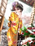  1girl bangs berries black_hair blurry blurry_foreground blush brown_eyes closed_mouth clouds cloudy_sky commentary_request depth_of_field dutch_angle eyebrows_visible_through_hair floral_print flower hair_flower hair_ornament highres japanese_clothes kimono long_sleeves looking_at_viewer original outdoors own_hands_together praying print_kimono purple_flower shrine sidelocks sky smile snow snowing solo swordsouls tree white_flower wide_sleeves yellow_kimono 