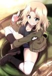  1girl blonde_hair blue_eyes boots breasts cleavage denim denim_shorts eyebrows_visible_through_hair from_above girls_und_panzer grin highres jacket kay_(girls_und_panzer) large_breasts long_hair looking_at_viewer nakahira_guy shorts sitting smile star tank_top thigh-highs 