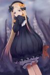  1girl abigail_williams_(fate/grand_order) bangs black_bow black_dress black_hat blonde_hair bloomers blue_eyes bow butterfly commentary_request covering_mouth dress dutch_angle fate/grand_order fate_(series) hair_bow hat highres holding holding_stuffed_animal long_hair long_sleeves looking_at_viewer orange_bow papipana parted_bangs polka_dot polka_dot_bow sleeves_past_wrists solo stuffed_animal stuffed_toy teddy_bear tentacle underwear very_long_hair white_bloomers 