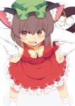  1girl animal_ears bow bowtie breasts brown_hair cat_ears cat_tail chen dress frilled_dress frills green_hat hands_on_hips hat highres jewelry leaning_forward legs_apart lolimate long_sleeves looking_at_viewer medium_breasts multiple_tails open_mouth orange_eyes red_dress short_dress simple_background single_earring slit_pupils smile socks solo tail touhou two_tails white_background white_legwear yellow_neckwear 