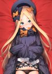  1girl abigail_williams_(fate/grand_order) bangs bed_sheet black_bow black_dress black_hat blonde_hair blue_eyes blush bow butterfly closed_mouth dakimakura dress dress_lift fate/grand_order fate_(series) furisuku hair_bow hat head_tilt lifted_by_self long_hair long_sleeves looking_at_viewer lying on_back orange_bow parted_bangs polka_dot polka_dot_bow sleeves_past_fingers sleeves_past_wrists solo very_long_hair 