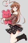  1girl ahoge aoi_renji ass bare_shoulders black_footwear blush boots brown_eyes brown_hair brown_jacket dress eyebrows_visible_through_hair full_body grey_background heart_ahoge highres holding holding_stuffed_animal jacket kantai_collection kuma_(kantai_collection) long_hair looking_at_viewer polka_dot polka_dot_dress simple_background solo stuffed_animal stuffed_toy teddy_bear tongue tongue_out 