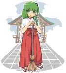  1girl :d blush broom commentary_request frog_hair_ornament full_body green_eyes green_hair hair_ornament hakama highres japanese_clothes kochiya_sanae long_sleeves looking_at_viewer miko open_mouth outdoors red_skirt sandals sasa_kichi shrine skirt smile snake_hair_ornament solo standing tabi touhou white_legwear wide_sleeves 
