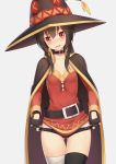  1girl anarchojs belt black_cape black_panties blush bow bow_panties brown_hair cape fingerless_gloves gloves hat highres kono_subarashii_sekai_ni_shukufuku_wo! megumin panties panty_pull red_eyes short_hair_with_long_locks simple_background single_thighhigh solo thigh-highs underwear witch witch_hat 