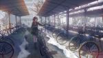  1girl bag bicycle bicycle_basket brown_eyes brown_hair coat commentary_request denki earmuffs gloves ground_vehicle looking_afar original outdoors scarf scenery short_hair shoulder_bag skirt snow solo walking winter 