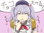  1girl beret blue_eyes chocolate commentary_request epaulettes food food_on_face hair_between_eyes hat heart holding holding_food ishii_hisao jacket kantai_collection kashima_(kantai_collection) kerchief long_sleeves red_neckwear short_hair silver_hair solo translation_request two_side_up white_jacket 