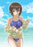  1girl bangs beach blue_swimsuit breasts closed_mouth clouds cloudy_sky competition_school_swimsuit cowboy_shot day eyebrows_visible_through_hair girls_und_panzer long_sleeves looking_at_viewer medium_breasts muichimon nishizumi_maho no_pants ocean off_shoulder shirt short_hair sky solo sparkle standing swimsuit unzipped yellow_shirt 