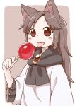  1girl :p animal_ears blush brown_background brown_hair candy_apple commentary_request eyebrows_visible_through_hair food gem holding imaizumi_kagerou long_sleeves looking_at_viewer poronegi red_eyes robe simple_background smile solo tongue tongue_out touhou wide_sleeves wolf_ears younger 