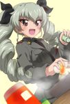  1girl :d anchovy anzio_military_uniform bangs belt black_neckwear black_ribbon black_shirt blurry blurry_background commentary_request cookie cracked_egg dress_shirt drill_hair dutch_angle egg eyebrows_visible_through_hair food girls_und_panzer green_background green_hair grey_jacket hair_ribbon holding holding_food jacket kanau long_hair long_sleeves looking_at_viewer military military_uniform necktie open_mouth red_eyes ribbon sam_browne_belt shaker shirt simple_background skillet smile solo twin_drills twintails uniform upper_body wing_collar 