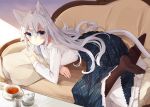 1girl animal_ears blue_eyes cat_ears cat_tail couch cup highres long_skirt nuko_miruku on_couch pantyhose pillow skirt tagme tail tea teacup teapot underskirt white_hair 