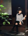  1girl annin_musou black_hair black_legwear black_skirt brown_footwear highres isokaze_(kantai_collection) kantai_collection kappougi long_hair long_sleeves open_mouth pleated_skirt red_eyes shoes sitting skirt solo thigh-highs 