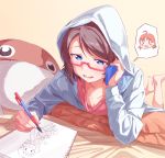  1girl absurdres barefoot bed_sheet blue_eyes blue_jacket character_pillow drawing feet_up gamjolno half-closed_eyes highres holding holding_phone hood hood_up hooded_jacket jacket love_live! love_live!_sunshine!! lying mechanical_pencil on_stomach open_mouth pencil phone pillow red-framed_eyewear semi-rimless_eyewear sketchbook smile solo spoken_person takami_chika talking_on_phone tan_background uchicchii under-rim_eyewear watanabe_you 