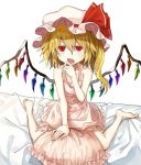  1girl bare_arms bare_shoulders barefoot bed_sheet blonde_hair collarbone flandre_scarlet full_body hair_between_eyes hand_up hat hat_ribbon highres long_hair looking_at_viewer manarou mob_cap nightgown on_bed open_mouth pink_hat pink_pillow red_eyes red_ribbon ribbon simple_background sitting solo touhou white_background wings 