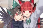  2girls :3 alternate_costume animal_ears bangs black_bow black_hair blunt_bangs bow braid cat_ears extra_ears feathered_wings green_bow hair_between_eyes hair_bow head_rest kaenbyou_rin long_hair long_sleeves looking_at_viewer multiple_girls one_eye_closed open_mouth pointy_ears red_eyes redhead reiuji_utsuho self_shot smile touhou toutenkou upper_body w wings 