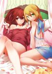  2girls absurdres bare_legs bare_shoulders blazblue blonde_hair brown_eyes brown_hair celica_a_mercury green_eyes highres looking_at_viewer medium_hair multiple_girls naked_sweater noel_vermillion official_art petals pillow ponytail sweater 