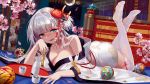  1girl :d alcohol azur_lane ball bangs bed bed_frame bed_sheet blinds blunt_bangs blush breasts choko_(cup) cleavage collarbone crescent_moon cup drunk eyebrows_visible_through_hair eyeshadow flower foreshortening hair_flower hair_ornament highres indoors japanese_clothes kimono large_breasts legs_up long_hair looking_at_viewer lying makeup moon night night_sky no_shoes nose_blush off_shoulder on_bed on_stomach open_mouth petals pink_flower ribbon-trimmed_legwear ribbon_trim sake shiny shiny_hair shoukaku_(azur_lane) silver_hair single_bare_shoulder sky smile solo sweat tassel temari_ball thigh-highs tokkuri tray white_kimono white_legwear wind_chime window zettai_ryouiki zjsstc 