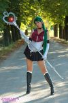  bishoujo_senshi_sailor_moon boots cosplay gloves green_hair long_hair meiou_setsuna photo photo_shoot posing red_eyes sailor_fuku sailor_pluto staff tiara white_gloves 