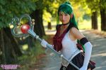  bishoujo_senshi_sailor_moon boots bow cosplay gloves green_hair long_hair meiou_setsuna photo photo_shoot red_eyes sailor_fuku sailor_pluto short_skirt staff tiara white_gloves 