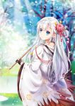  1girl azur_lane bangs bare_tree black_gloves blue_eyes blue_sky blunt_bangs blurry blurry_background closed_mouth eyebrows_visible_through_hair flower from_behind gloves hair_flower hair_ornament hair_over_shoulder highres holding hood hood_down japanese_clothes kimono light_rays long_hair looking_at_viewer looking_back mutang nape open_mouth outdoors partly_fingerless_gloves petals pond shoukaku_(azur_lane) sidelocks silver_hair sky smile solo tassel tree wide_sleeves wind 