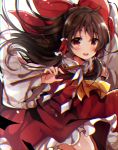  1girl :d blush bow brown_hair commentary_request detached_sleeves eyebrows_visible_through_hair frilled_shirt_collar frilled_skirt frilled_sleeves frills gohei hair_bow hair_tubes hakurei_reimu long_hair long_sleeves looking_at_viewer nontraditional_miko open_mouth red_bow red_eyes red_shirt red_skirt shirt skirt skirt_set sleeveless sleeveless_shirt smile solo touhou uguisu_mochi_(ykss35) very_long_hair wide_sleeves 
