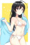  1girl ahoge bangs bikini black_eyes black_hair blue_towel breasts cleavage closed_mouth collarbone commentary cowboy_shot girls_und_panzer holding holding_towel isuzu_hana light_smile long_hair looking_at_viewer medium_breasts navel outside_border side-tie_bikini solo standing swimsuit tam_a_mat towel white_bikini yellow_background 