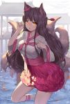  1girl absurdres ahri animal_ears black_hair breasts facial_mark fox_ears fox_girl fox_tail hair_ornament highres korean_clothes large_breasts league_of_legends lee_seok_ho lips long_hair multiple_tails paw_pose slit_pupils solo tail whisker_markings yellow_eyes 