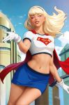  1girl bird blonde_hair blue_eyes blue_sky cape city dc_comics emblem gloves hairband highres looking_at_viewer midair midriff navel red_cape skirt sky smile solo stanley_lau stomach supergirl superhero superman_(series) toned white_gloves 