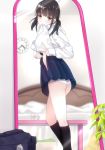  1girl afilia_(kiyomin) ass bangs black_hair black_legwear blue_skirt blurry blurry_background blush brown_hair clock closed_mouth collared_shirt commentary_request cup depth_of_field eyebrows_visible_through_hair head_tilt highres kiyomin kneehighs long_sleeves looking_at_viewer mouth_hold mug original panties plant pleated_skirt potted_plant red_eyes reflection shirt shirt_in_mouth silver_hair skirt sleeves_past_wrists solo standing underwear wall_clock white_panties white_shirt 