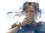  1girl absurdres apple blue_dress bracelet bun_cover china_dress chinese_clothes chun-li double_bun dress earrings eating food frills fruit grey_eyes highres holding holding_fruit jewelry looking_to_the_side puffy_sleeves spiked_bracelet spikes street_fighter street_fighter_iv_(series) street_fighter_v upper_body yasuda_akira 