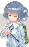  1girl backpack bag blue_eyes blue_hair closed_mouth eyebrows_visible_through_hair hair_bobbles hair_ornament highres kawashiro_nitori key long_sleeves looking_away looking_down monosenbei short_hair short_twintails solo squinting touhou twintails upper_body 