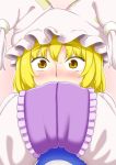  1girl blonde_hair blush commentary_request covering_face embarrassed eyebrows_visible_through_hair hands_in_sleeves hands_up hat long_sleeves looking_at_viewer nose_blush pillow_hat pink_background poronegi short_hair solo sweatdrop tabard touhou upper_body wide-eyed yakumo_ran yellow_eyes 