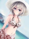  1girl anastasia_(idolmaster) arms_behind_back bare_shoulders bikini_top blue_eyes blue_sky blush breasts cleavage collarbone cowboy_shot day dutch_angle eyebrows_visible_through_hair hat horizon idolmaster idolmaster_cinderella_girls looking_at_viewer nannacy7 navel ocean print_bikini_top sarong short_hair silver_hair sky small_breasts solo standing stomach straw_hat sun_hat water white_bikini_top white_hat 