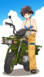  1girl bangs black_footwear blue_bikini_top breasts brown_eyes brown_hair cleavage closed_mouth clothes_around_waist clouds cloudy_sky commentary_request day full_body girls_und_panzer gloves grey_gloves ground_vehicle helmet holding honda_motra jumpsuit looking_at_viewer mechanic medium_breasts motor_vehicle motorcycle nakajima_(girls_und_panzer) outdoors shadow shirt_around_waist shoes short_hair sitting sky smile solo uona_telepin white_background 