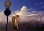  1girl arm_up black_skirt blurry blurry_foreground brown_eyes brown_hair building clouds cloudy_sky cowboy_shot crying crying_with_eyes_open day depth_of_field evening from_side grey_shirt instrument_case long_sleeves miniskirt mocha_(cotton) mountain original outdoors power_lines profile road_sign scenery shirt short_hair sign skirt sky solo standing tears telephone_pole tree village wiping_face 