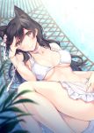  1girl alternate_costume animal_ears ass atago_(azur_lane) azur_lane bangs bikini black_hair blurry_foreground blush breasts brown_eyes choker cleavage closed_mouth eyebrows_visible_through_hair flower groin hair_between_eyes hair_flower hair_ornament hair_ribbon hammock hand_on_own_face highres itoichi. large_breasts long_hair looking_at_viewer lying mole mole_under_eye palm_leaf ribbon sidelocks smile solo sparkle stomach swept_bangs swimsuit thighs water white_bikini 