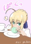  1girl ahoge artoria_pendragon_(all) blonde_hair cup dango eating fate_(series) food gin&#039;you_haru green_eyes hair_ribbon highres pink_background ribbon saber sweatdrop table wagashi 