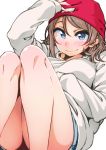  1girl ayumu-k beanie blue_eyes grey_hair hand_on_headwear hat highres knees_up long_sleeves looking_at_viewer love_live! love_live!_sunshine!! red_hat shirt short_hair short_shorts shorts simple_background sleeves_past_wrists smile solo sweatshirt watanabe_you white_background white_shirt 