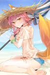  1girl :&lt; animal_ears ass bangs bare_legs barefoot beach beach_umbrella bikini bikini_under_clothes blue_bikini blue_sky blush breasts brown_eyes closed_mouth commentary_request day ears_through_headwear fate/grand_order fate_(series) fox_ears fox_girl fox_tail hair_between_eyes hat head_tilt highres horizon looking_at_viewer looking_back medium_breasts ocean outdoors parasol pink_hair sand see-through shirt short_sleeves side-tie_bikini sitting sky smile solo straw_hat swimsuit tail tamamo_(fate)_(all) tamamo_no_mae_(swimsuit_lancer)_(fate) tomozero umbrella wariza water wet wet_clothes wet_shirt wet_t-shirt white_shirt yellow_eyes 