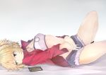  1girl absurdres blonde_hair blue_shorts bra breasts cellphone cleavage cleavage_cutout collarbone denim denim_shorts eyebrows_visible_through_hair fate/apocrypha fate_(series) green_eyes grey_background hair_between_eyes hair_ornament hair_scrunchie highres jacket looking_away lying medium_breasts mordred_(fate) mordred_(fate)_(all) on_back open_clothes open_jacket phone ponytail red_jacket red_scrunchie scrunchie short_hair shorts smartphone solo torn_clothes torn_shorts underwear white_bra 