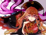  1girl blonde_hair brown_hair finger_licking hat junko_(touhou) licking long_hair looking_at_viewer lying on_stomach red_eyes satou_pote shadow simple_background solo tail touhou wavy_hair 
