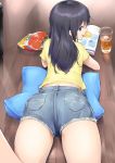  1girl ass black_hair blue_eyes book calbee_(potato_chips) chips commentary_request cup cushion dabuki drinking_glass eyebrows_visible_through_hair food highres long_hair looking_back lying mouth_hold on_stomach open_book original pocket potato_chips profile shirt short_shorts shorts solo thighs wooden_floor yellow_shirt 