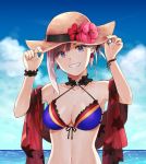  1girl asymmetrical_hair bikini blue_eyes breasts buttery_(zzzbutterzzz) cleavage collarbone day earrings fate/grand_order fate_(series) flower hair_ornament hat hat_flower hat_ribbon hibiscus highres jewelry large_breasts leaf_print looking_at_viewer miyamoto_musashi_(fate/grand_order) navel ocean outdoors pink_hair ponytail red_flower ribbon solo straw_hat swimsuit 