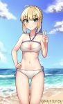  1girl artist_name artoria_pendragon_(all) bare_shoulders beach bikini blonde_hair blue_ribbon blue_sky blush braid breasts brown_hair cleavage clouds collarbone cowfee day eyebrows_visible_through_hair fate/stay_night fate_(series) french_braid green_eyes hair_ribbon hand_on_hip highres looking_at_viewer medium_breasts navel ribbon saber sky smile solo swimsuit v white_bikini 