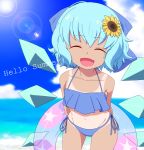  1girl :d absurdres aqua_hair arms_behind_back bangs bare_shoulders beach bikini blue_bikini blue_bow blue_sky bow cirno clouds cloudy_sky collarbone commentary_request cowboy_shot day english eyebrows_visible_through_hair facing_viewer fang flower groin hair_bow hair_flower hair_ornament halterneck highres ice ice_wings innertube leaning_forward lens_flare open_mouth outdoors shikabane_homura short_hair side-tie_bikini sky smile solo standing summer sun sunflower sunlight swimsuit tan tanline tanned_cirno tongue touhou wings 