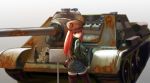  1girl breasts envada ground_vehicle hammer_and_sickle hat jacket long_hair military military_vehicle motor_vehicle original red_eyes redhead shorts su-85 tank tank_destroyer weapon 