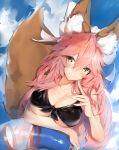  1girl animal_ears arm_rest bangs bikini black_bikini blue_sky blush breasts brown_eyes cleavage closed_mouth clouds cloudy_sky collarbone commentary_request day eyebrows_visible_through_hair fate/grand_order fate_(series) fingernails fox_ears fox_girl fox_tail front-tie_bikini front-tie_top hair_between_eyes hand_up head_tilt highres innertube large_breasts long_hair looking_at_viewer outdoors pink_hair silver_(chenwen) sky smile solo swimsuit tail tail_raised tamamo_(fate)_(all) tamamo_no_mae_(fate) transparent very_long_hair 